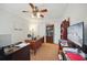 Well-lit office space with carpet flooring and built-in shelving at 7623 Excitement Dr, Reunion, FL 34747