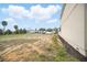 Expansive vacant lot surrounded by mature trees and upscale homes, presenting a prime opportunity for new construction at 7623 Excitement Dr, Reunion, FL 34747