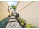 A brick walkway between two homes at 7623 Excitement Dr, Reunion, FL 34747