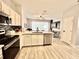Bright kitchen featuring stainless steel appliances and an open concept design at 7660 Otterspool St, Kissimmee, FL 34747