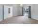 Spacious bedroom featuring carpet, sliding glass doors to screened patio with pool views at 8122 Yellow Crane Dr, Kissimmee, FL 34747
