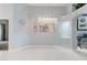 Elegant dining area with chandelier and tiled floors at 8122 Yellow Crane Dr, Kissimmee, FL 34747