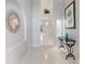 Elegant foyer featuring tile flooring and stylish decor at 8122 Yellow Crane Dr, Kissimmee, FL 34747