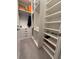 Organized walk-in closet with custom shelving and ample storage space at 8289 Topsail Pl, Winter Garden, FL 34787