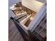 Staircase with wooden and metal railings showing carpeted steps and hardwood landing at 8289 Topsail Pl, Winter Garden, FL 34787