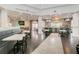 The restaurant has tables and chairs with a bar and multiple TVs for viewing at 841 Retreat Blvd # 101, Davenport, FL 33897