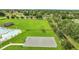 Community features a basketball court and a pool with a splash pad for the residents at 943 Van Loon Ct, Kissimmee, FL 34758