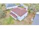 Aerial view of the home showcasing its backyard and roof at 943 Van Loon Ct, Kissimmee, FL 34758