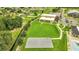 Community amenities include a basketball court, clubhouse, and lush green landscaping at 943 Van Loon Ct, Kissimmee, FL 34758