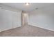 Bedroom features carpet floors and a closet with bi-fold doors at 943 Van Loon Ct, Kissimmee, FL 34758