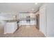 Modern kitchen with stainless steel appliances, granite countertops, and ample cabinet space at 943 Van Loon Ct, Kissimmee, FL 34758