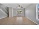 Bright living room featuring tile floors and a fan at 943 Van Loon Ct, Kissimmee, FL 34758
