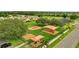 A community playground offers a fun place for to play with sunshades and play structures at 943 Van Loon Ct, Kissimmee, FL 34758