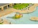 Pool features a splash pad for the and plenty of lounge chairs for parents at 943 Van Loon Ct, Kissimmee, FL 34758