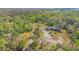 Secluded home surrounded by lush greenery and trees at 953 Baron Rd, Orlando, FL 32828
