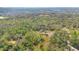 Secluded home surrounded by lush greenery and trees at 953 Baron Rd, Orlando, FL 32828