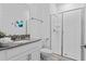Modern bathroom with a glass-enclosed shower, stylish vanity, and contemporary fixtures at 1048 Leader St, Davenport, FL 33896