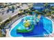 Vibrant splash pad with playful water features, slides, and lounge chairs for Gathering fun at 1048 Leader St, Davenport, FL 33896