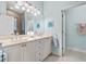 Bathroom showcasing dual vanity with marble countertops and ample storage at 1154 Celebration Ave, Celebration, FL 34747