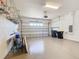 Two car garage with epoxy floor and an automatic garage door at 133 Indian Wells Ave, Kissimmee, FL 34759