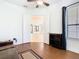 Living room with laminate floors, ceiling fan and open floor plan at 133 Indian Wells Ave, Kissimmee, FL 34759