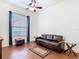 Comfortable living room with laminate floors, ceiling fan and modern furniture at 133 Indian Wells Ave, Kissimmee, FL 34759