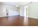 Spacious main bedroom with laminate floors, ceiling fan, and bright natural light at 133 Indian Wells Ave, Kissimmee, FL 34759