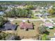 An aerial view of home, showcasing the spacious layout, fenced backyard, and neighborhood at 15069 Sw 29Th Avenue Rd, Ocala, FL 34473