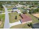 Aerial view of the property with a long driveway, landscaping, and a serene neighborhood setting at 15069 Sw 29Th Avenue Rd, Ocala, FL 34473