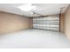 This garage has white floors and a white garage door at 15069 Sw 29Th Avenue Rd, Ocala, FL 34473