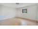 Cozy bedroom with neutral carpet, a bright window, and ample natural light at 1590 Twelve Oaks Cir, Kissimmee, FL 34744