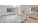 Bright kitchen area and tile flooring at 1590 Twelve Oaks Cir, Kissimmee, FL 34744