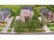 Top-down aerial view of a grand residence featuring a spacious yard, mature trees, and private pool at 1686 Shadowmoss Cir, Lake Mary, FL 32746