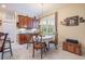 Dining area features table with seating for four and built-in cabinetry at 1686 Shadowmoss Cir, Lake Mary, FL 32746