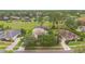 A beautiful home with a well-manicured lawn and mature trees adding to its curb appeal at 1686 Shadowmoss Cir, Lake Mary, FL 32746