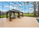 Gazebo with outdoor seating in a screened backyard at 1686 Shadowmoss Cir, Lake Mary, FL 32746