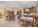 Bright kitchen with a breakfast bar and open dining area with natural lighting at 1686 Shadowmoss Cir, Lake Mary, FL 32746