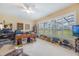 Spacious office with generous natural light, extensive desk space, and window views overlooking the greenery at 1686 Shadowmoss Cir, Lake Mary, FL 32746