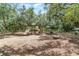 Community playground nestled among mature trees offering slides and play equipment for outdoor fun at 1686 Shadowmoss Cir, Lake Mary, FL 32746