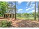 Community picnic shelter overlooking a tranquil pond in Magnolia Plantation, perfect for relaxation and enjoying nature at 1686 Shadowmoss Cir, Lake Mary, FL 32746