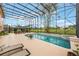Gorgeous pool with a screened enclosure offering outdoor entertainment space at 1686 Shadowmoss Cir, Lake Mary, FL 32746