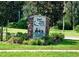 Magnolia Plantation Golf Club signage featuring stone accents and manicured landscaping at 1686 Shadowmoss Cir, Lake Mary, FL 32746