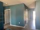 Hallway with neutral paint and tile flooring that gives access to other rooms at 1707 Ambar Ct, Winter Haven, FL 33881