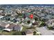 Picture of a cozy home surrounded by a tranquil neighborhood on a sunny day at 2020 Windcrest Lake Cir, Orlando, FL 32824