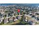 Attractive house in a quiet suburban neighborhood surrounded by lush greenery at 2020 Windcrest Lake Cir, Orlando, FL 32824