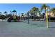 Vibrant community playground featuring swings, slides, and a safe play surface at 2020 Windcrest Lake Cir, Orlando, FL 32824