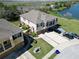 Beautiful aerial view of townhome near a lake and highway offering a scenic view and convenient location at 2120 Betsy Ross Ln, St Cloud, FL 34769