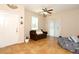 Cozy living room featuring tile floors, comfortable seating, and an inviting atmosphere with natural light at 2120 Betsy Ross Ln, St Cloud, FL 34769