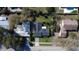 Birds eye view of the home and landscaped yard and neighborhood at 2654 Derbyshire Rd, Maitland, FL 32751