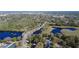 Aerial view of a neighborhood shows natural scenery near community at 2654 Derbyshire Rd, Maitland, FL 32751